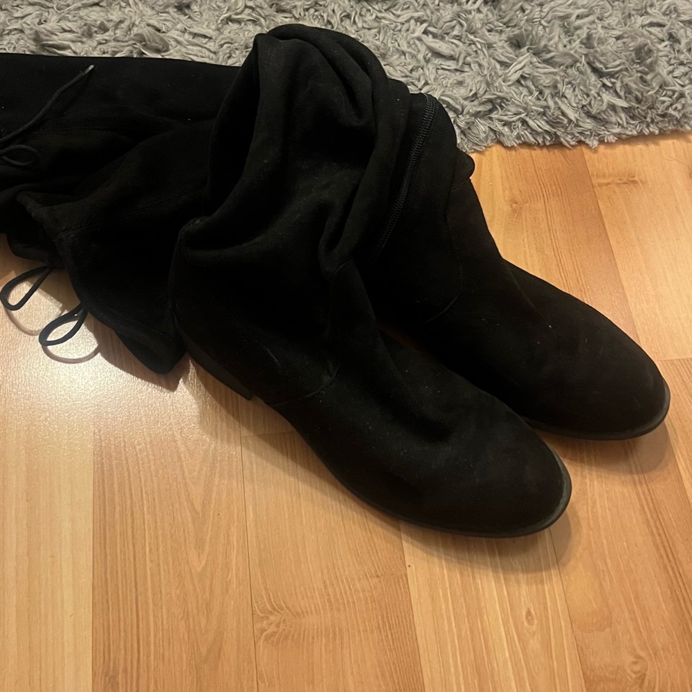 black thigh high boots